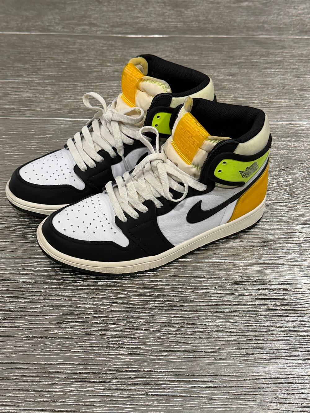 These are Air Jordan 1 Retro High OG “Volt Gold” men’s size 8.5